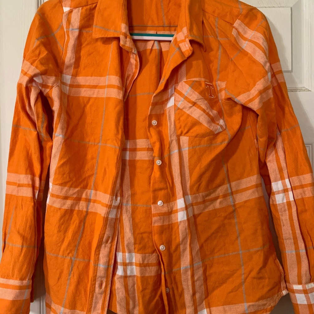 Woman’s orange plaid university of TN button up